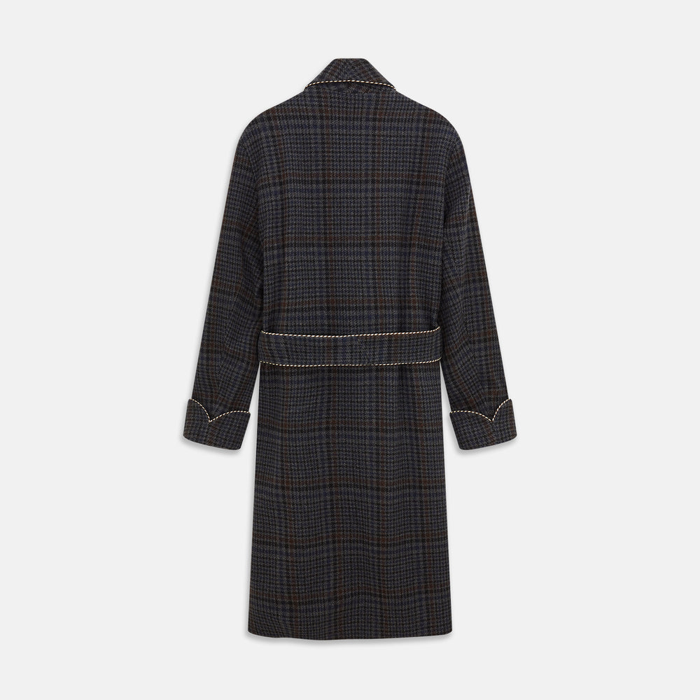 The Turnbull & Asser Charcoal Grey Check Wool Pierce Gown features a long, gown-style silhouette with a shawl collar, wrap-around belt, cuffed sleeves, and white edge stitching, shown against a plain white background.