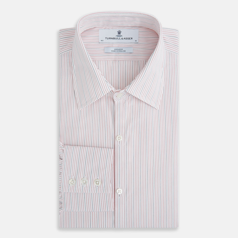 The Red Hairline Stripe Westminster Shirt by Turnbull & Asser features a pointed collar and thin vertical stripes in a light hue, displayed flat against a white background—a fine example of British craftsmanship.
