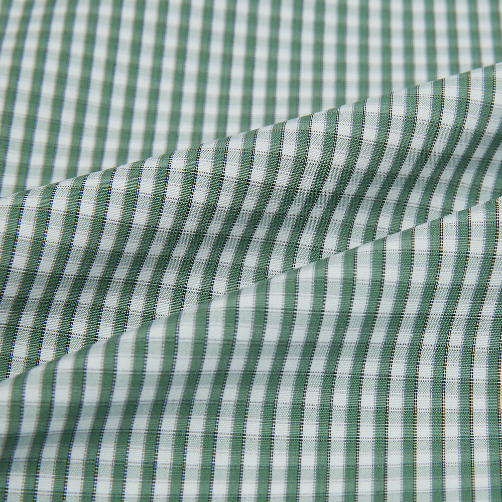 The MELON GREEN MICRO SHADOW CHECK WESTMINSTER SHIRT by Turnbull & Asser is a long-sleeved, button-up shirt with a green and white checkered pattern, pointed collar, and buttoned cuffs, shown on a white background.
