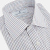View 2 of product The Turnbull & Asser Sky Blue Multi Graph Check Shirt features long sleeves, a button-up front, pointed T&A collar, buttoned cuffs, and a small blue-and-white check pattern, shown on a white background.
