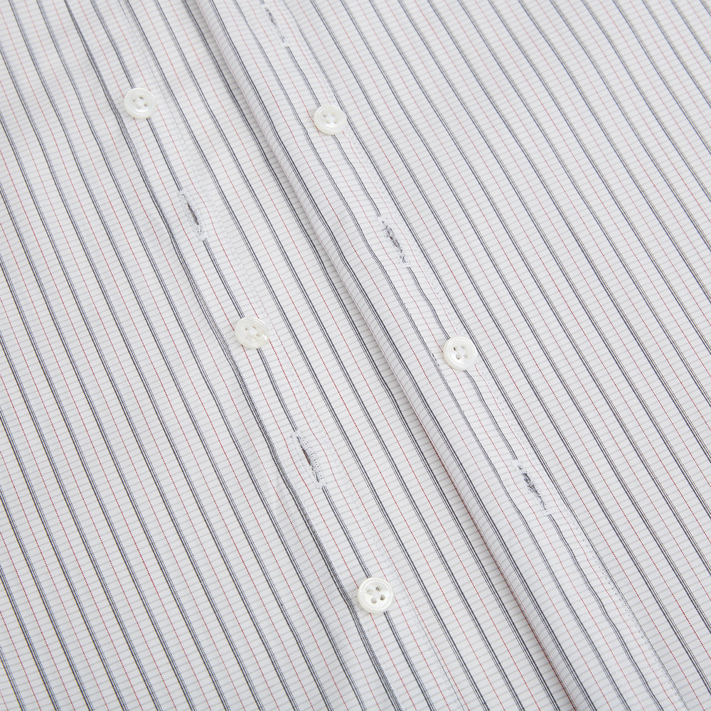 A red and navy graph check Westminster shirt by Turnbull & Asser with a formal collar and tailored fit, featuring a button-up front and buttoned cuffs, laid flat on a white background.