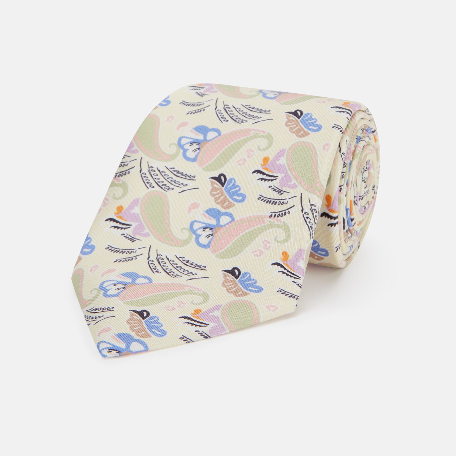 View 1 of product A rolled-up Cream Multi Bloomsbury-Inspired Pattern Silk Tie by Turnbull & Asser, featuring a pastel floral and paisley design in green, blue, pink, and orange tones, displayed on a white background.