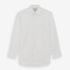 View 1 of product The Turnbull & Asser White Pleated Cotton Dress Shirt features a T&A collar, double cuffs, a button-down front, elegant chest pleats, and a slightly curved hem for a classic formal look.
