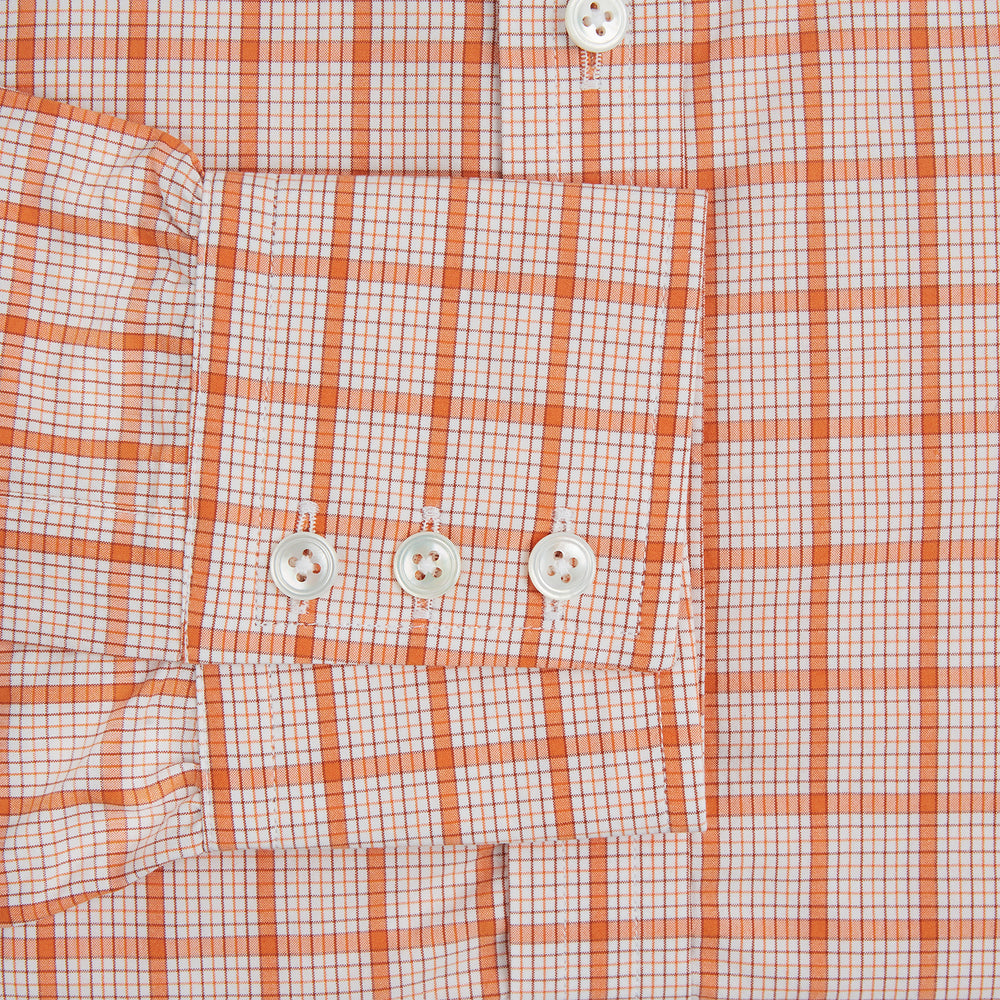 The Turnbull & Asser Orange Graph Overlay Check Mayfair Shirt is a soft organic cotton long-sleeve with button-down front, collar, and cuffs—an ideal capsule wardrobe staple—shown on a plain white background.