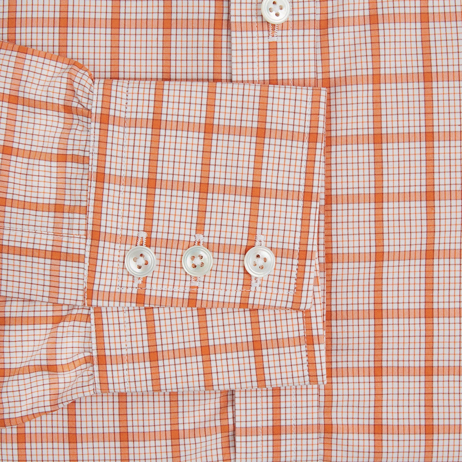 View 3 of product The Turnbull & Asser Orange Graph Overlay Check Mayfair Shirt is a soft organic cotton long-sleeve with button-down front, collar, and cuffs—an ideal capsule wardrobe staple—shown on a plain white background.