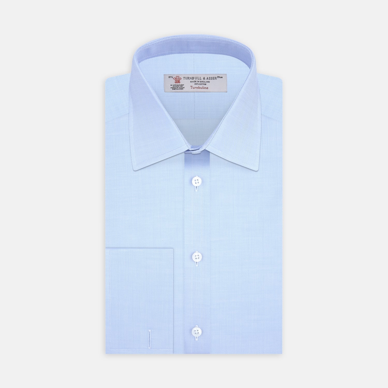 View 1 of product The Turnbull & Asser Light Blue Herringbone Superfine Cotton Shirt features a T&A collar and 3-button cuffs, elegantly displayed against a plain white background.