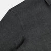 View 6 of product The Ash Linen Windsor Shirt by Turnbull & Asser is a long-sleeve, button-up black shirt with a Windsor collar and cuffs, reflecting British craftsmanship, shown on a plain white background.