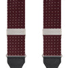 View 2 of product Turnbull & Asser Burgundy Small Spot Adjustable Silk Braces, featuring small white dots, black leather ends, and silver clasps, are displayed vertically on a plain white background for refined sartorial style.