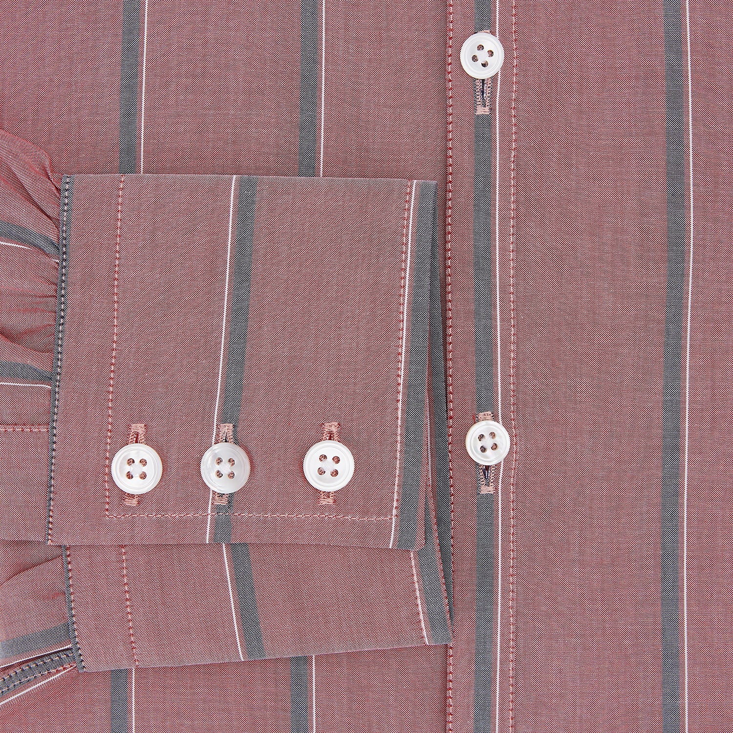View 4 of product The Turnbull & Asser Red Track Stripe Westminster Shirt features British craftsmanship, a collar, pink base with vertical blue and white stripes, white buttons, and a pocket-free front for refined appeal.