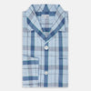 View 5 of product The Turnbull & Asser Blue Multi Check Pyjama Shirt features a blue and white check pattern, long sleeves, and a collar—an elegant loungewear option perfect for nightwear.