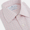 View 2 of product The Turnbull & Asser Red Micro Graph Check Mayfair Shirt is a long-sleeved, button-up Italian cotton shirt with a spread collar and buttoned cuffs, shown on a plain white background.