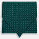 The Turnbull & Asser Turquoise and Forest Green Micro Dot Silk Cravat features a refined micro dot pattern, adding sophisticated style to formal looks. Displayed on a white background.