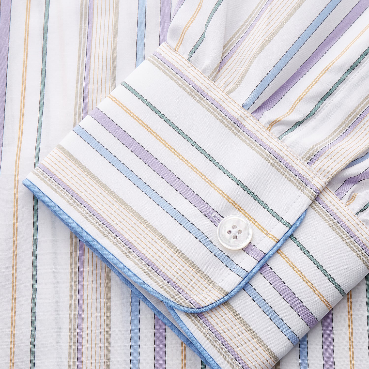 View 2 of product The Turnbull & Asser Colourful Garden Multi Stripe Cotton Sussex Nightshirt is UK-made, featuring vibrant stripes on white for timeless style and luxurious sleepwear comfort.