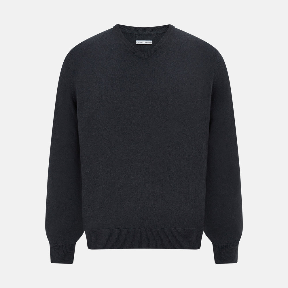 The Turnbull & Asser Dark Green Cashmere V-Neck Jumper features long sleeves, ribbed cuffs, and a ribbed waistband, showcased against a white background.