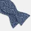 View 2 of product The Turnbull & Asser Pale Blue Paisley Silk Bow Tie, an elegant men's accessory, is showcased against a plain white background.