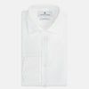 View 5 of product The Turnbull & Asser Tailored Fit White Marcella Front Shirt features a Kent Collar and double cuffs, shown laid flat on a white background. Perfect as a black tie shirt for formal events.