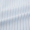 View 6 of product The Turnbull & Asser Navy and Blue Shadow Stripe Mayfair Shirt, featuring a classic T&A collar and buttoned cuffs, is laid flat on a white background.