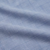 View 2 of product The Turnbull & Asser Pale Blue Multi Check Cotton Weekend Fit Williams Shirt features short sleeves, a pointed collar, single chest pocket, and premium Italian cotton with a subtle checkered pattern, shown on a white background.