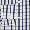 View 4 of product The Turnbull & Asser Navy Plaid Check Mayfair Shirt is crafted from pure cotton in white and navy checks, featuring a pointed collar and buttoned cuffs—perfect for formal looks.