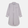 View 1 of product The Turnbull & Asser Red and Blue Multi Stripe Cotton Sussex Nightshirt features long sleeves, a knee-length cut, collared neckline, button placket, chest pocket with dark trim, and rounded hem for luxurious sleepwear.