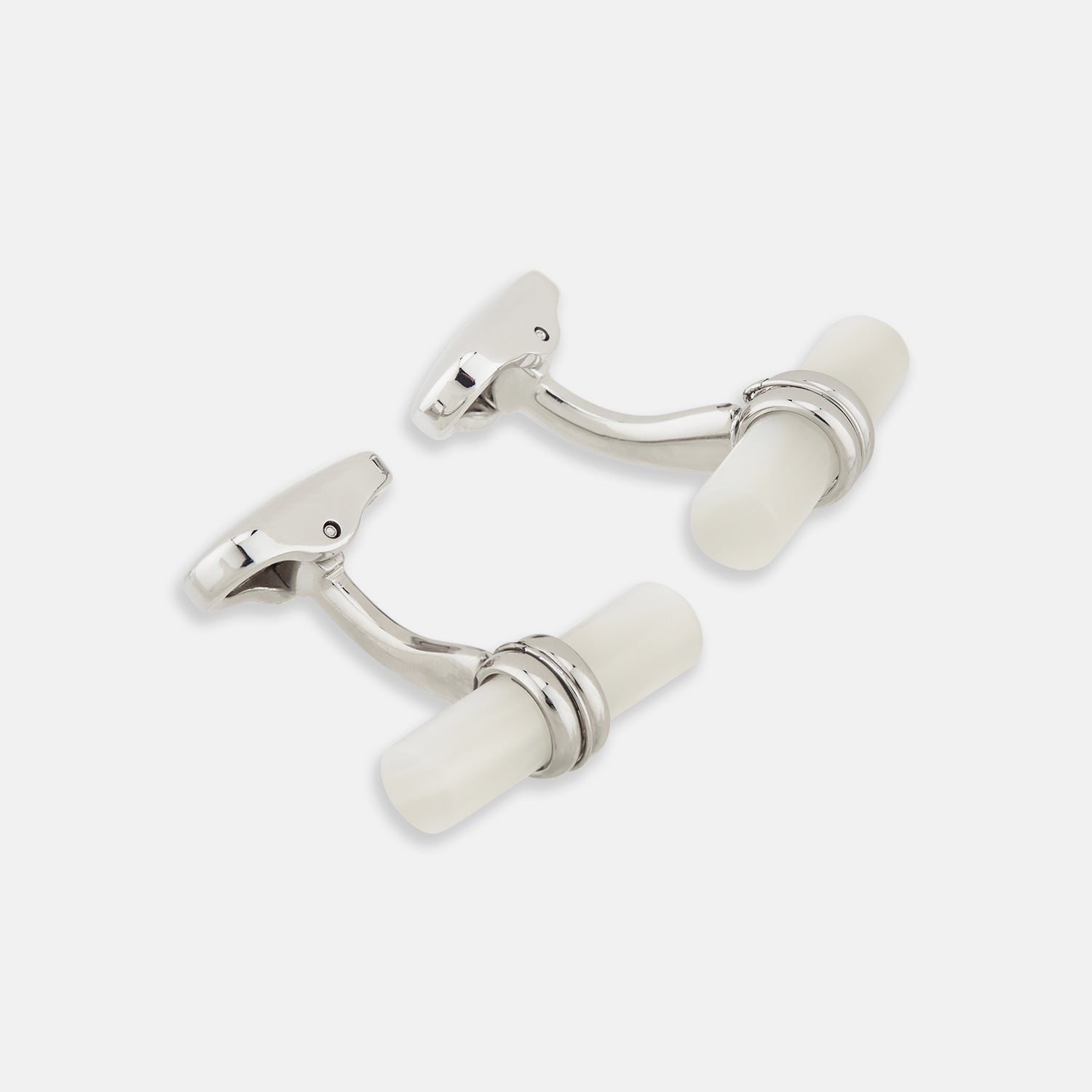 View 1 of product Turnbull & Asser Mother of Pearl Handlebar Cufflinks feature sleek cylindrical white bars, elegantly displayed against a plain white background.