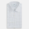 View 5 of product The Blue Grid Check Mayfair Shirt by Turnbull & Asser is a long-sleeve, button-up shirt with a T&A collar, crafted from organic cotton in a light and dark blue grid pattern, shown flat against a white background.