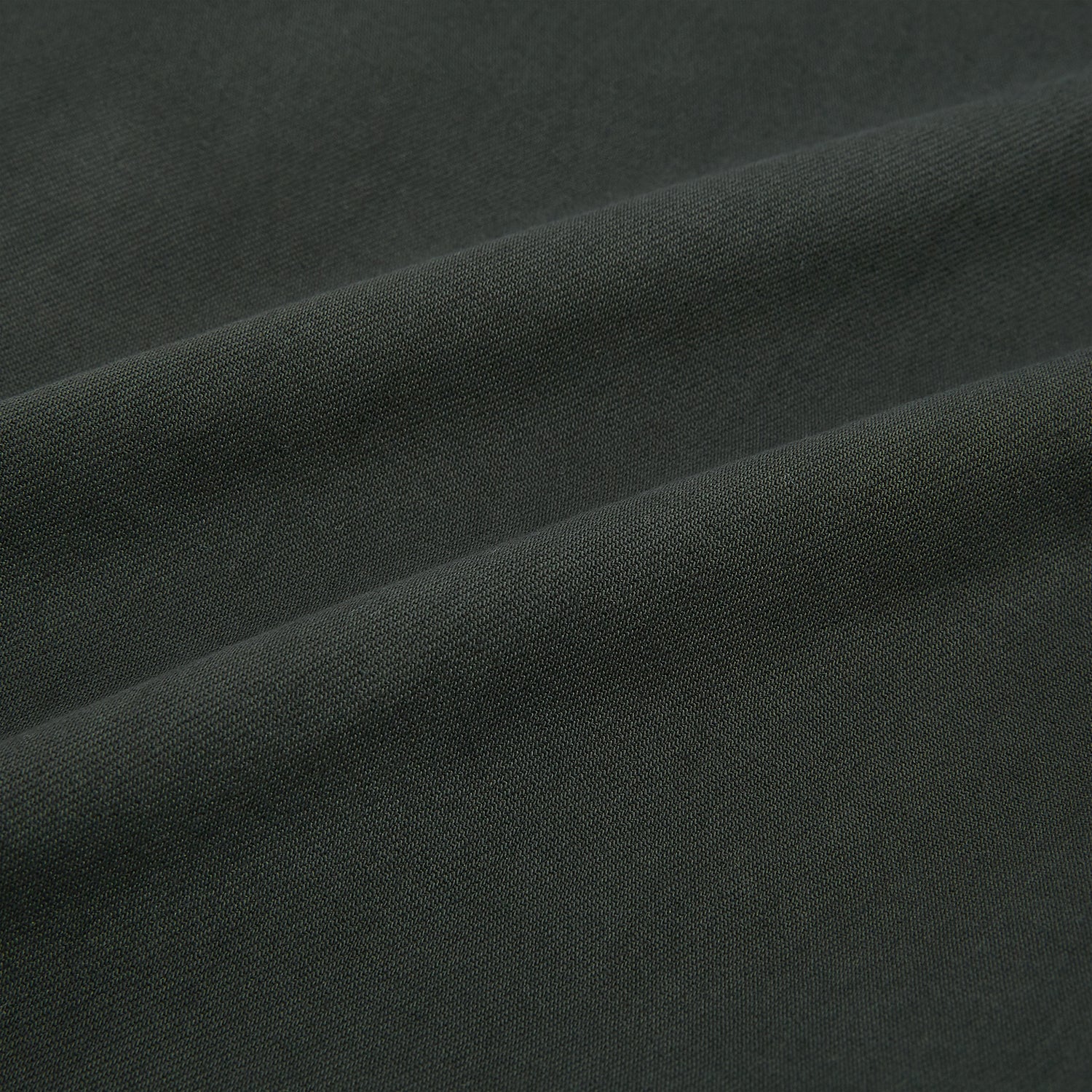 View 7 of product The Forest Green Henry B Trousers by Turnbull & Asser feature a minimalist straight-leg design in a wool/cashmere blend with belt loops and button closure, shown against a plain white background.