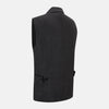View 4 of product The Turnbull & Asser Ash Collared Linen Waistcoat is a sleeveless dark gray piece with a button-down front, two zippered side pockets, and a small chest pocket, shown against a plain white background.