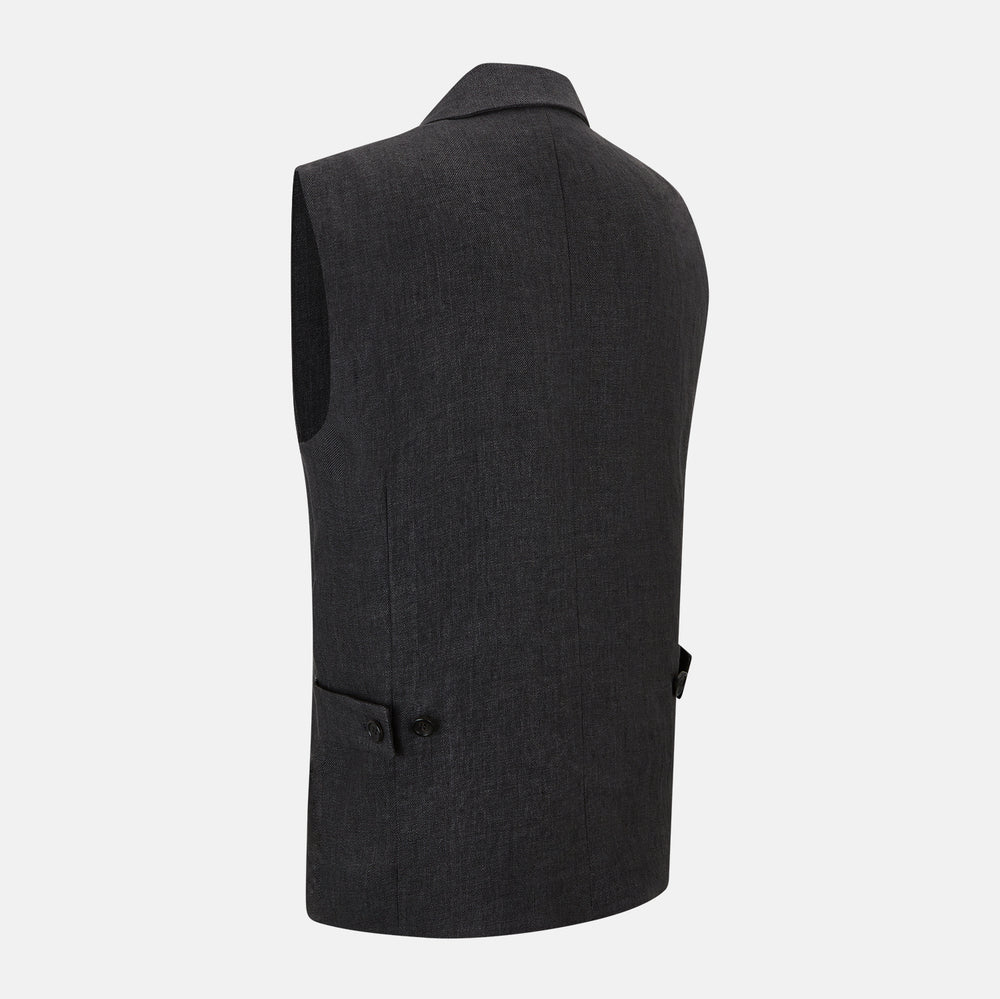 The Turnbull & Asser Ash Collared Linen Waistcoat is a sleeveless dark gray piece with a button-down front, two zippered side pockets, and a small chest pocket, shown against a plain white background.