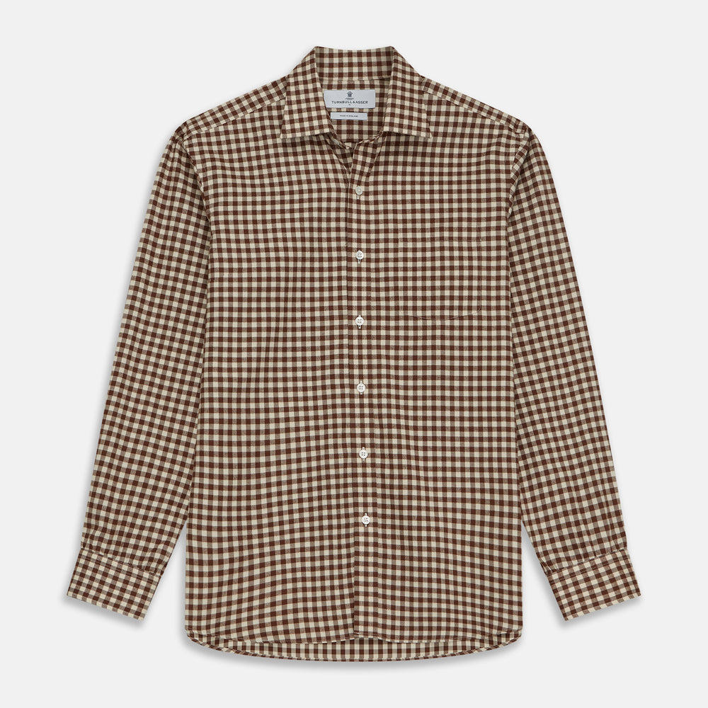 The Turnbull & Asser Brown Check Weekend Fit Shirt features a Derby collar, 1-button cuffs, and a brown check pattern—ideal for winter layering. Shown against a plain white background.