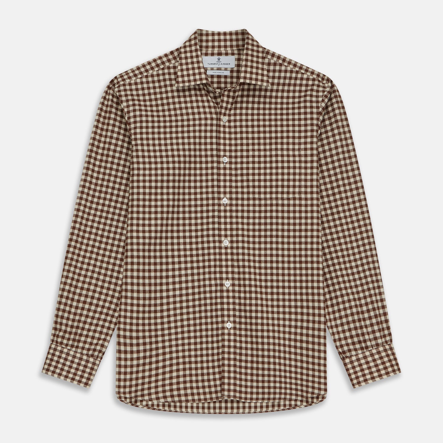 View 1 of product The Turnbull & Asser Brown Check Weekend Fit Shirt features a Derby collar, 1-button cuffs, and a brown check pattern—ideal for winter layering. Shown against a plain white background.