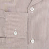View 4 of product The Turnbull & Asser Brown Micro Check Quarzo Nightshirt is a long-sleeve shirt dress inspired by classic sleepwear, featuring a collar, chest pocket, upper front buttons, and a subtle micro check pattern on a white background.