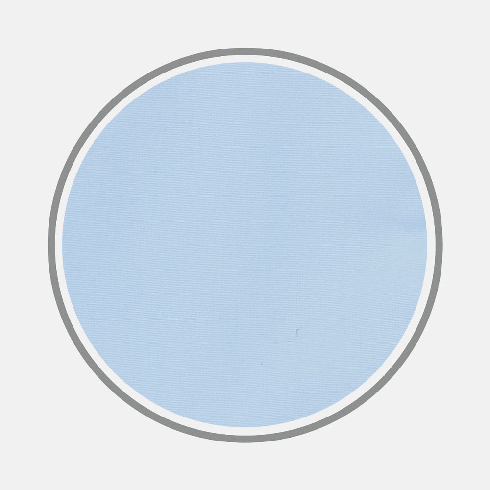 A circular swatch of Turnbull & Asser Light Blue Sea Island Quality Cotton Fabric, subtly textured and bordered by thin gray and white rings, displayed on a plain white background.