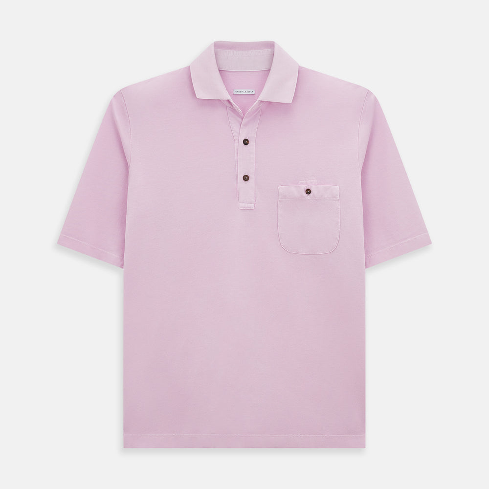 The Turnbull & Asser Pink Polo Shirt is a men's cotton polo with short sleeves, a collar, three dark buttons, and a chest pocket with a button, shown laid flat on a white background.