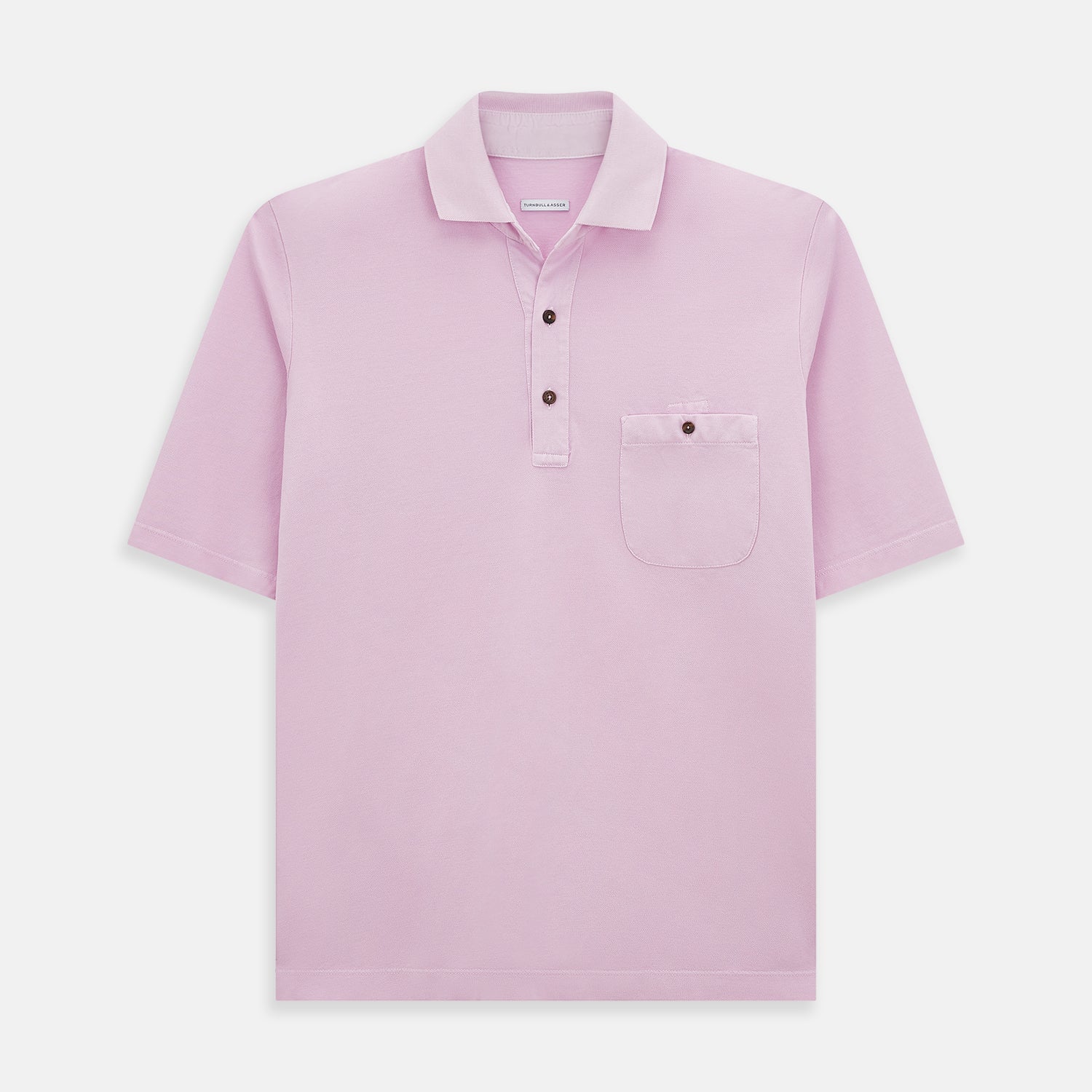 View 1 of product The Turnbull & Asser Pink Polo Shirt is a men's cotton polo with short sleeves, a collar, three dark buttons, and a chest pocket with a button, shown laid flat on a white background.