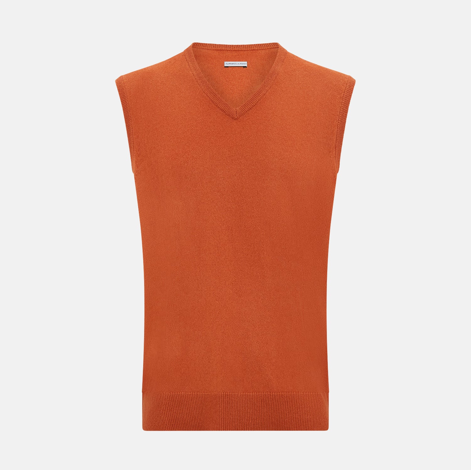 View 1 of product The Turnbull & Asser Orange Cashmere V-Neck Vest adds vibrant style to men’s fashion, featuring a ribbed hem and sleeveless design. Shown against a plain white background.