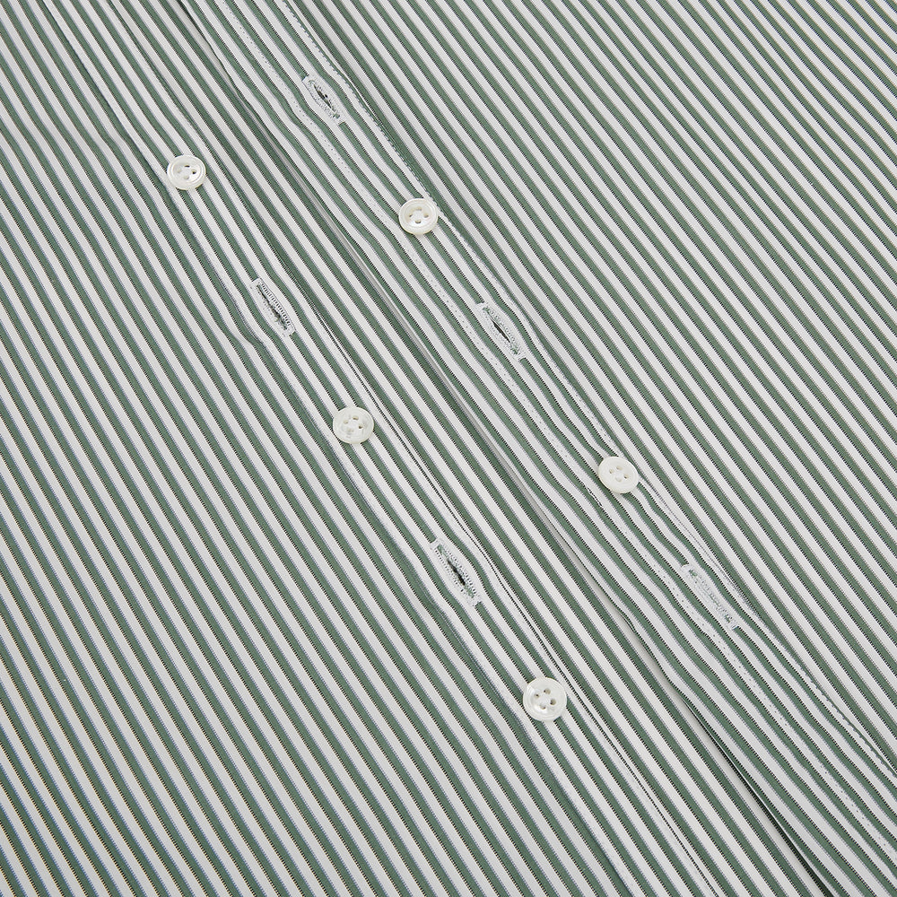 The Melon Green Halo Stripe Westminster Shirt by Turnbull & Asser, featuring thin green and white stripes and a classic Turnbull collar, is displayed against a plain white background—a testament to refined British craftsmanship.