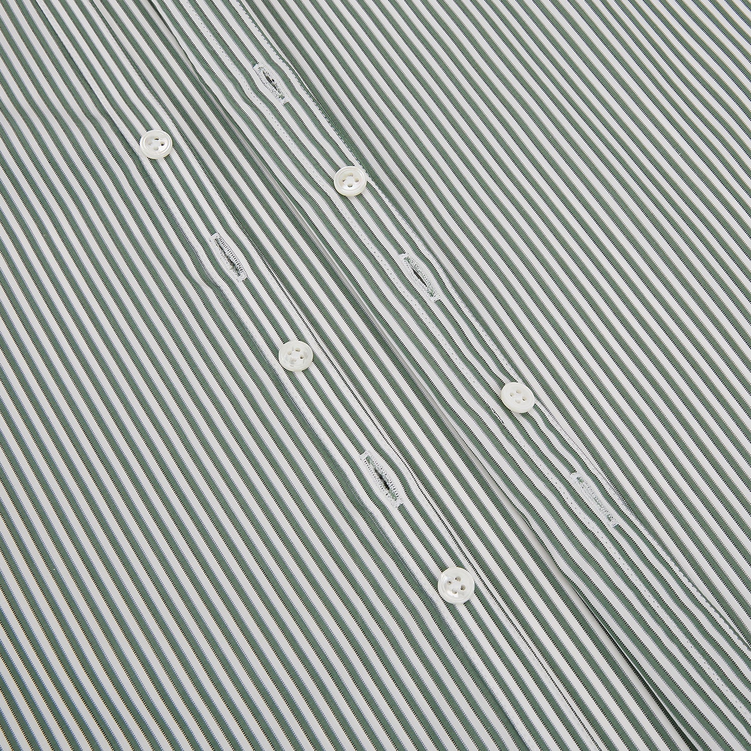 View 7 of product The Melon Green Halo Stripe Westminster Shirt by Turnbull & Asser, featuring thin green and white stripes and a classic Turnbull collar, is displayed against a plain white background—a testament to refined British craftsmanship.