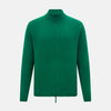 View 1 of product The Turnbull & Asser Forest Green Merino High Neck Zipped Cardigan features a ribbed collar, cuffs, and hem for classic style—this vibrant knitwear essential is shown against a white background.