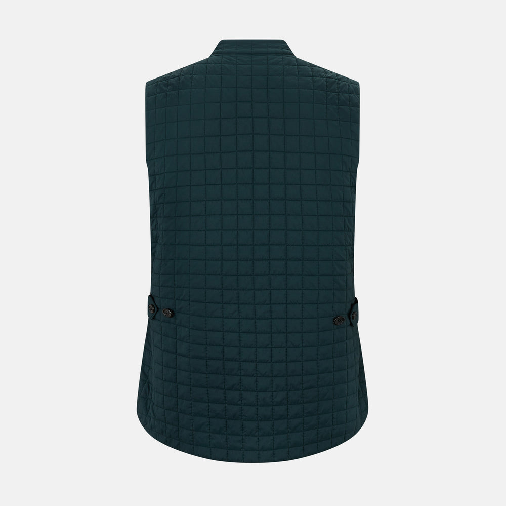 The Turnbull & Asser Forest Green Double-Breasted Quilted Gilet features black buttons, a chest pocket, two zippered side pockets, and an overlapping collar—ideal for layered dressing against a plain white background.