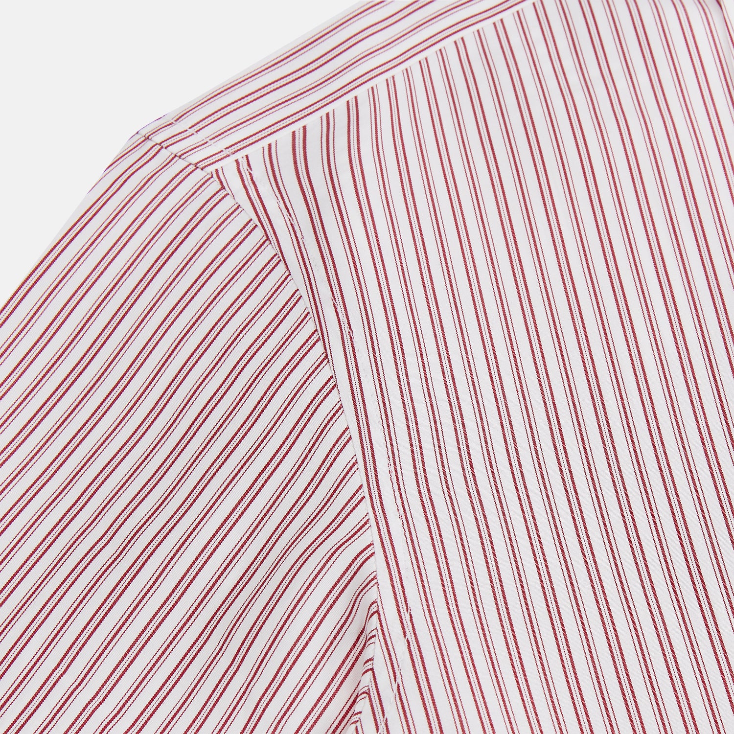 View 6 of product The Red Ticking Stripe Westminster Shirt by Turnbull & Asser features long sleeves, a button-up front, and vertical red and white stripes, shown flat on a white background.