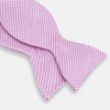 View 3 of product The Turnbull & Asser Pink and White Houndstooth Silk Bow Tie is shown against a plain white background, making it a stylish choice for formalwear.