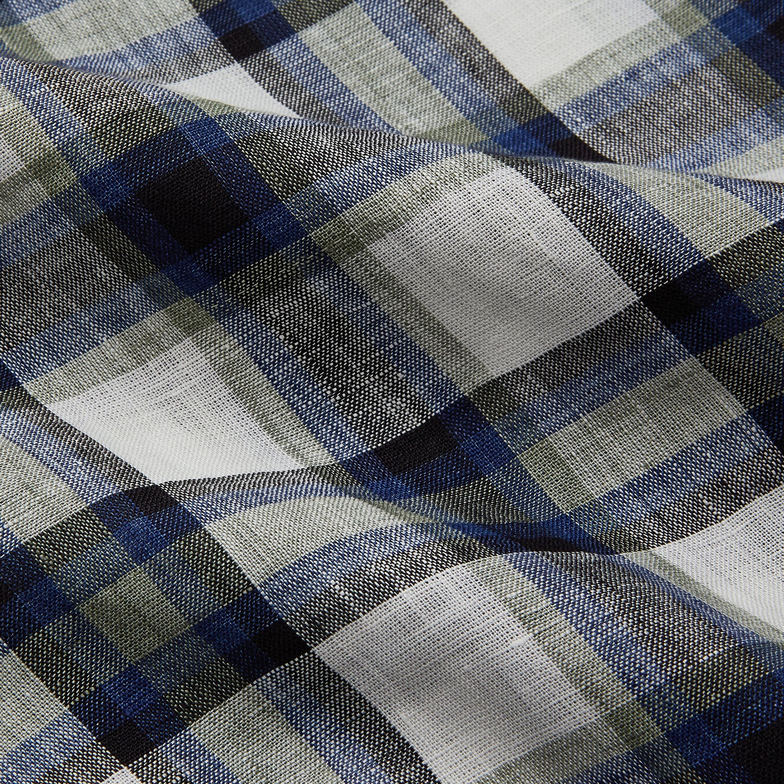 View 3 of product A Green Multi Check Linen Holiday Fit Winnington Shirt by Turnbull & Asser, featuring a check pattern and revere collar, displayed flat on a white background.