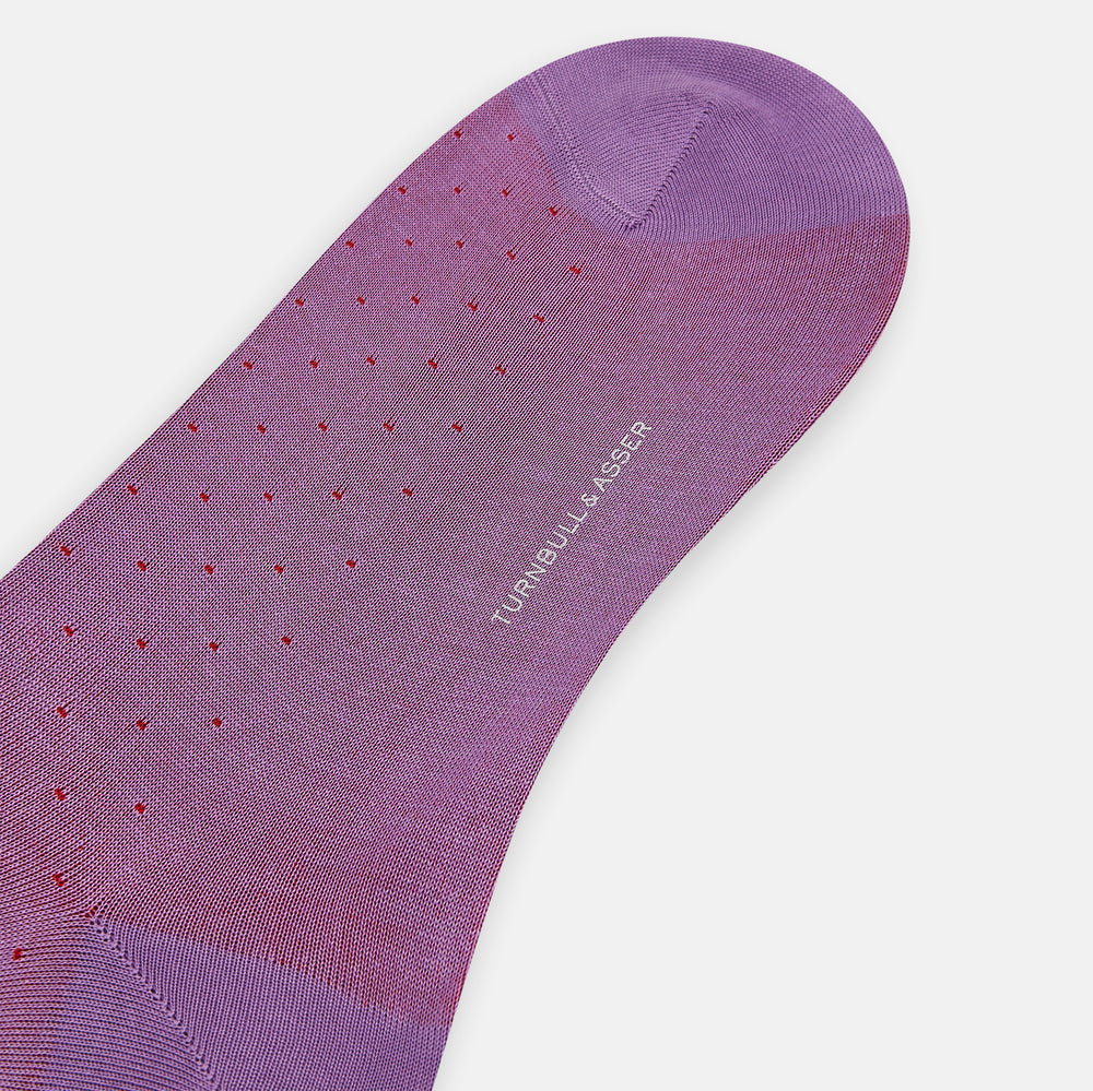 A single Turnbull & Asser Dark Pink/Red Polka Dot Mid-Length Sock featuring a ribbed cuff, displayed on a white background.
