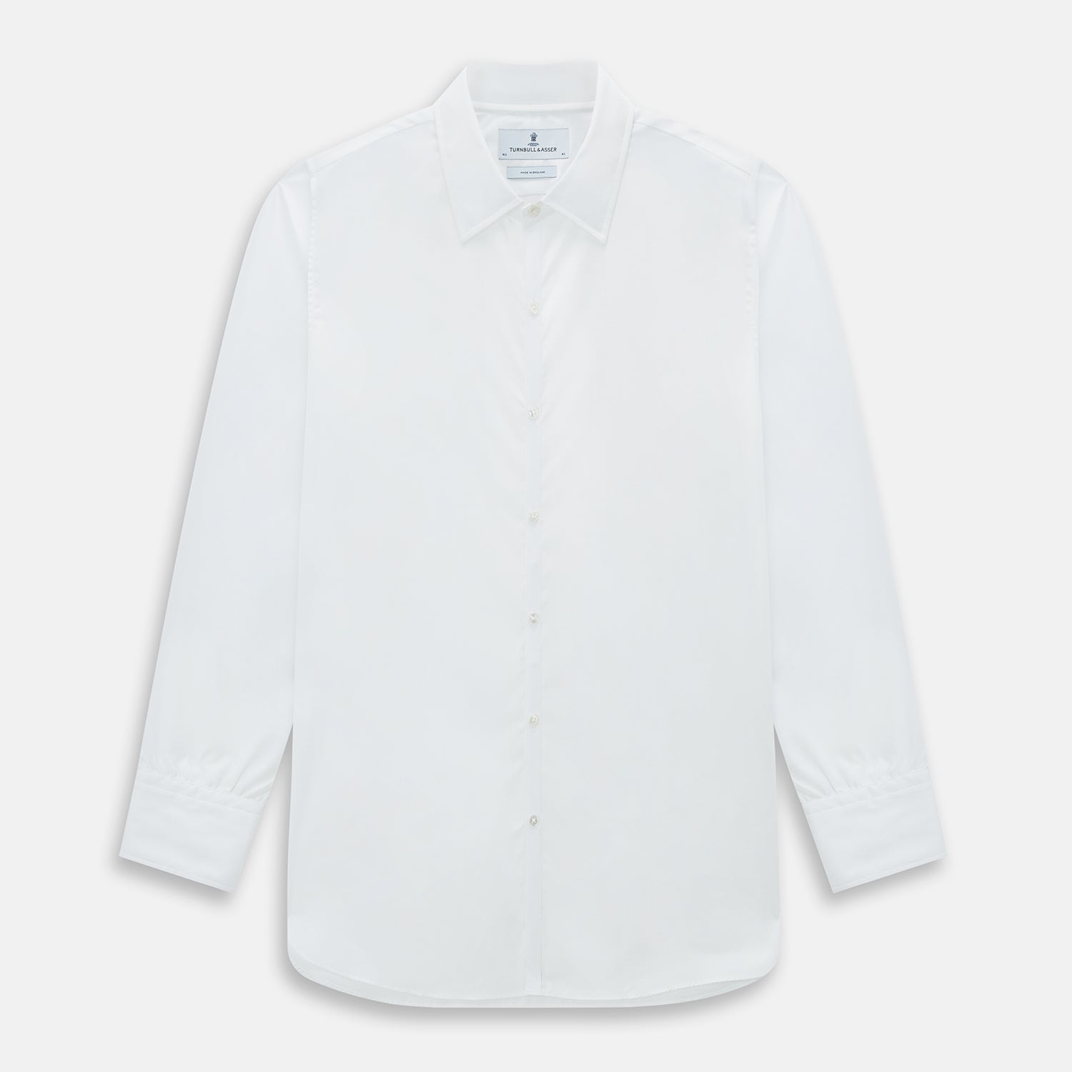 View 1 of product The PLAIN WHITE WESTMINSTER SHIRT WITH TURNBULL COLLAR AND 3-BUTTON CUFFS by Turnbull & Asser features refined British craftsmanship, long sleeves, a straight hem, and a crisp white design displayed on a plain background.
