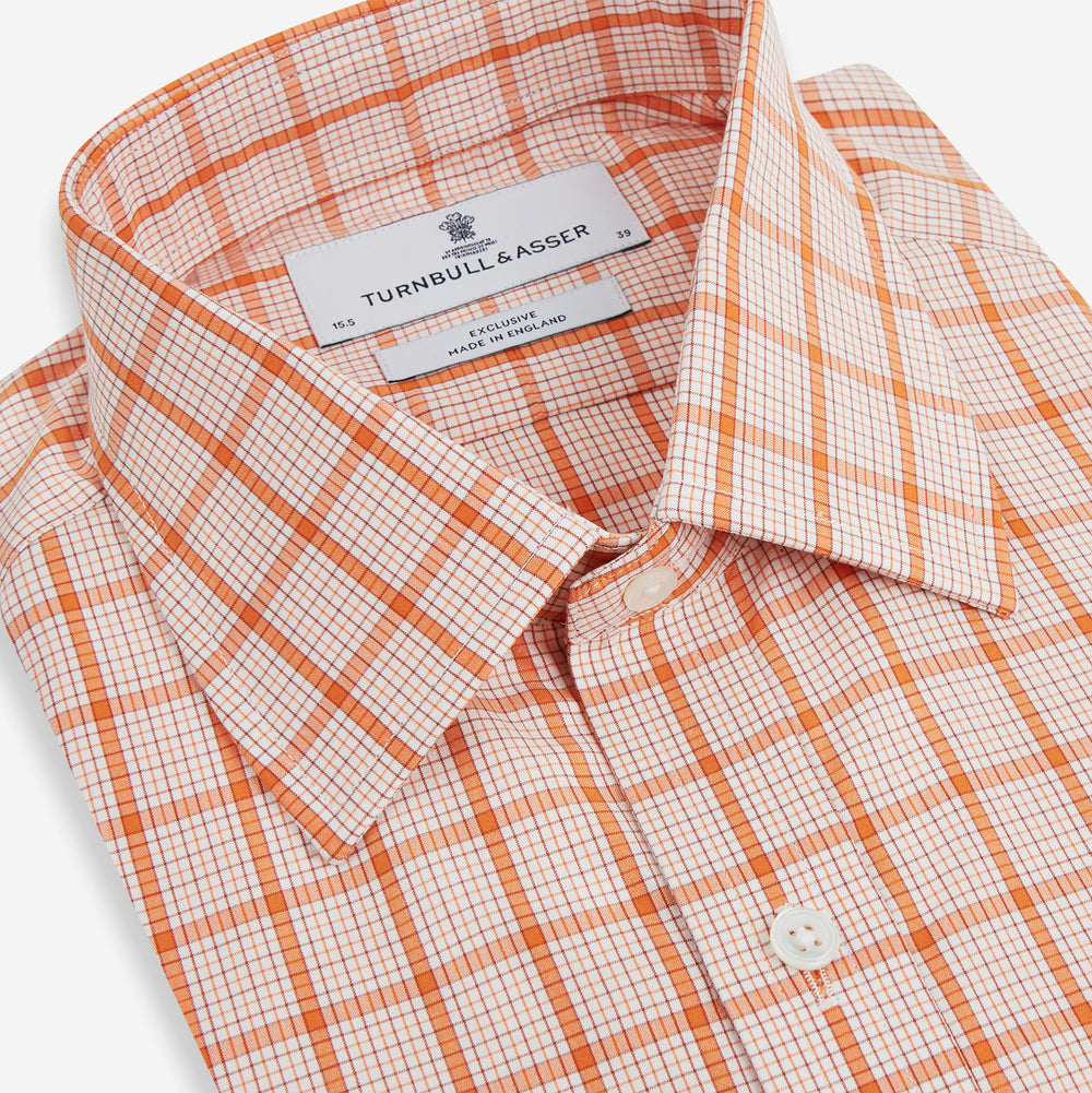 The Turnbull & Asser Orange Graph Overlay Check Mayfair Shirt is a soft organic cotton long-sleeve with button-down front, collar, and cuffs—an ideal capsule wardrobe staple—shown on a plain white background.