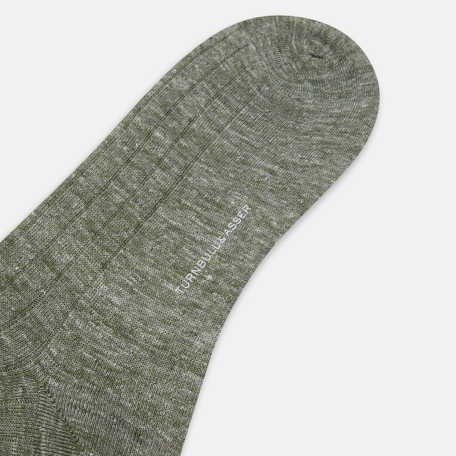 View 3 of product The Forest Green Linen Mid-Length Sock by Turnbull & Asser features a ribbed texture and is shown upright on a plain white background. Made from breathable linen, it offers comfort and style for everyday wear.