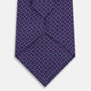 View 3 of product The Turnbull & Asser Purple Square and Circle Silk Tie is crafted from fine English silk, showcasing a purple design with a repeating geometric pattern of squares and circles for a refined, elegant look.