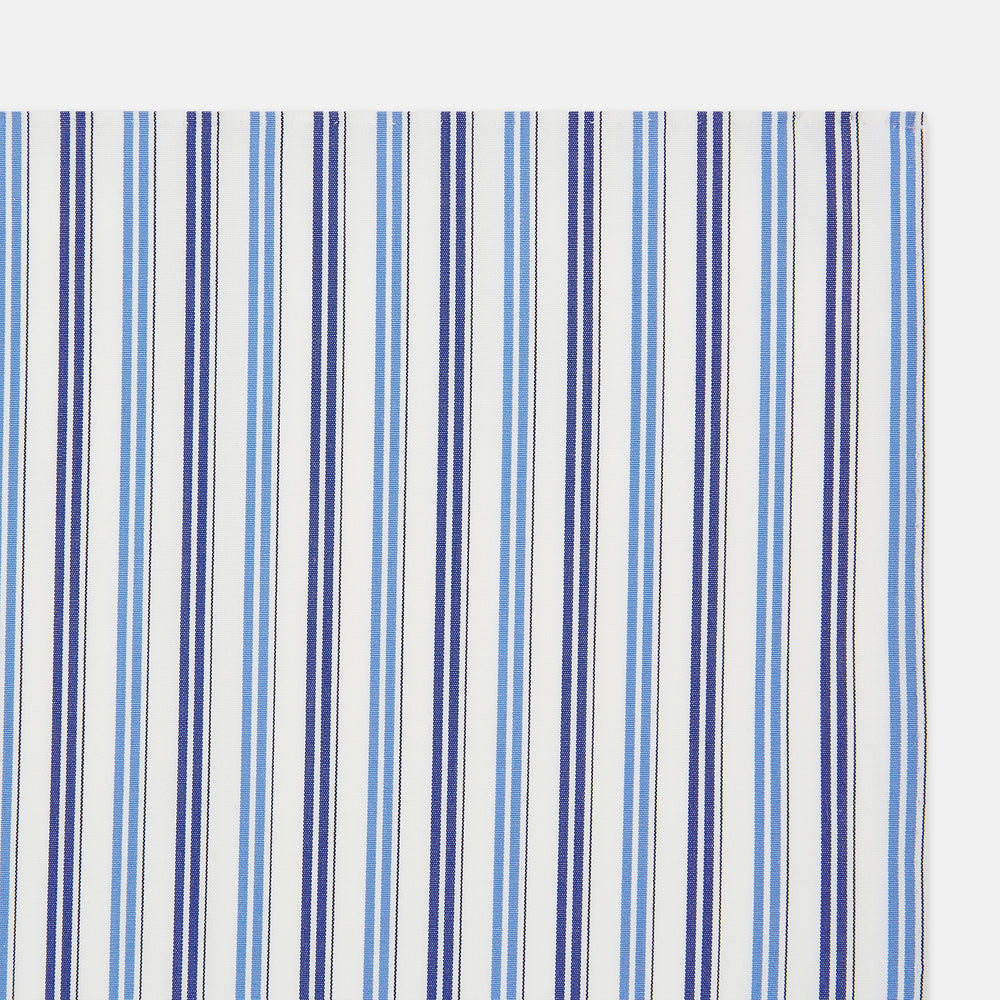 The Blue and Navy Multi Stripe Hand-Rolled Handkerchief by Turnbull & Asser is crafted in England with a white background and evenly spaced vertical stripes in blue and navy.