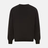 View 3 of product The Turnbull & Asser Dark Brown Cashmere V-Neck Jumper features long sleeves, ribbed cuffs, and a ribbed hem—timeless knitwear shown on a white background, perfect for elevating any wardrobe.